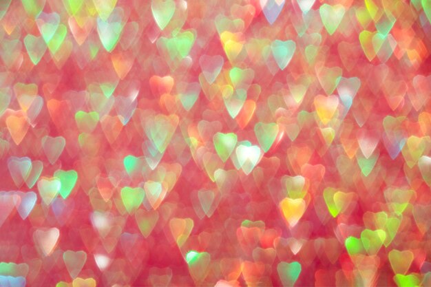 Foto corações multicoloridos espumantes bokeh abstrato fundo desfocado para o dia dos namorados
