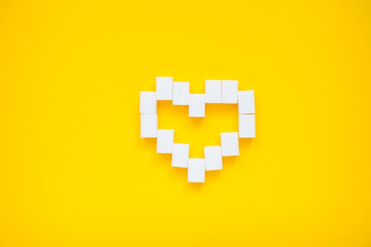Foto corazón de terrones de azúcar prensados