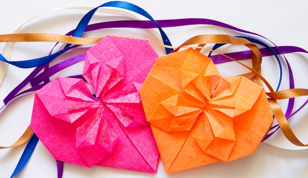 Corazones hechos de papel origami Antecedentes para el día de San Valentín