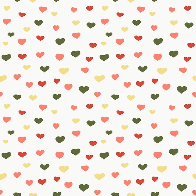 Corazones multicolores dibujados a mano sobre fondo marfil