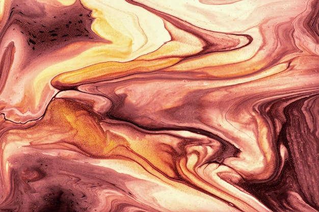 Cores roxas e douradas escuras do fundo abstrato da arte fluida. Mármore líquido. Pintura acrílica com gradiente de vinho
