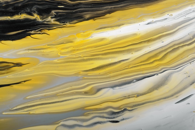 Cores tendências de 2021. Ondas de cinza, amarelo e preto fluem. Fundo ou textura do efeito de mármore. Fluid Art.