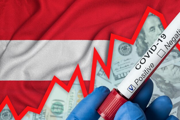 Coronavirus en Austria. Análisis de sangre positivo en el fondo de la bandera. Incremento de la incidencia. Crisis económica.