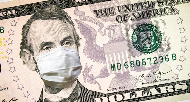 Coronavirus in den USA Präsident Lincoln mit Gesichtsmaske auf 5-Dollar-Geldschein COVID19 wirkt sich auf den globalen Aktienmarkt aus