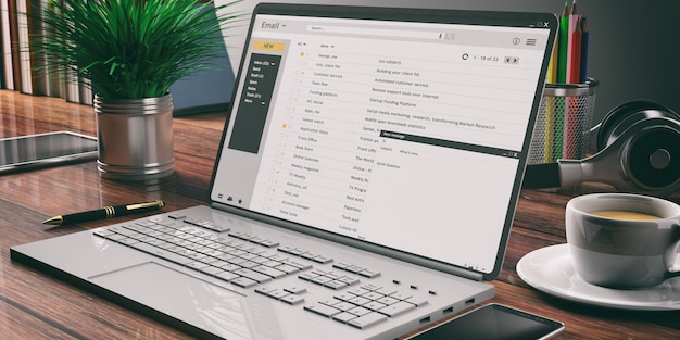 Foto correos electrónicos en una pantalla de computadora portátil escritorio de madera fondo de oficina ilustración 3d