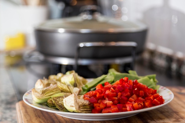 Cortar las verduras para cocinar