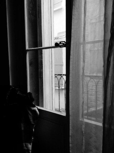Foto cortina en la ventana de casa
