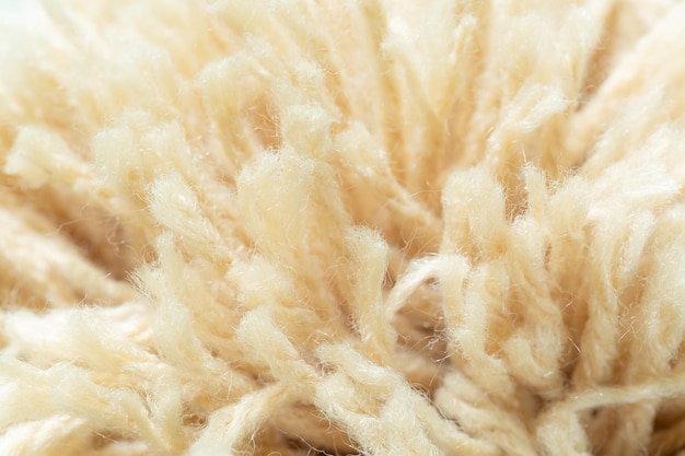 Cosechas de algodón crudoMáquina de hilado de hilo de algodón macroFondo de la fibra de algodón crudo