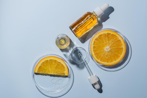 Cosméticos naturales investigación de laboratorio biociencia cuidado de la piel orgánico frutas de naranja y aceites cosméticos belleza de la naturaleza pruebas de exfoliación AHA