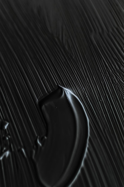 Cosméticos textura abstracta fondo pintura acrílica negra pincelada textura crema producto como telón de fondo de maquillaje para el diseño de banner de vacaciones de marca de belleza de lujo