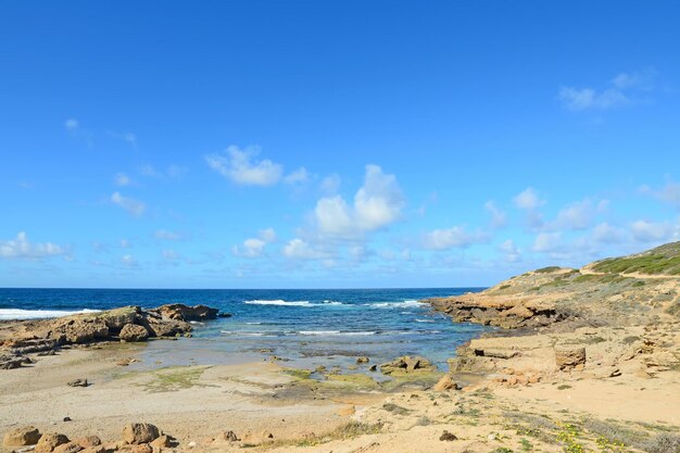 Costa de Argentiera con arena y rocas