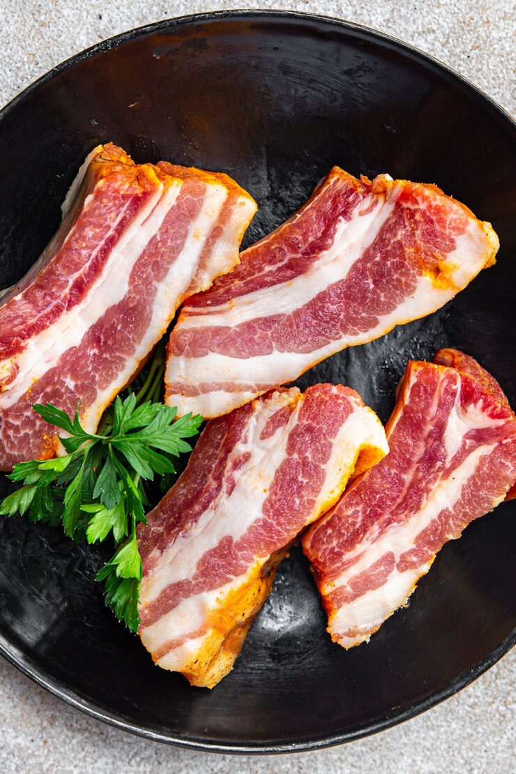 Foto costillas crudas carne fresca de cerdo especias pimentón comida bocadillo en la mesa copia espacio fondo de comida rústico