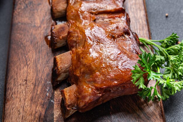 costillas a la parrilla cerdo barbacoa comida frita bocadillos en la mesa espacio de copia fondo de alimentos