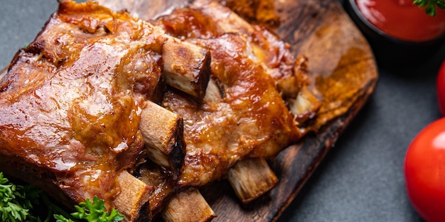 costillas a la parrilla cerdo barbacoa comida frita bocadillos en la mesa espacio de copia fondo de comida