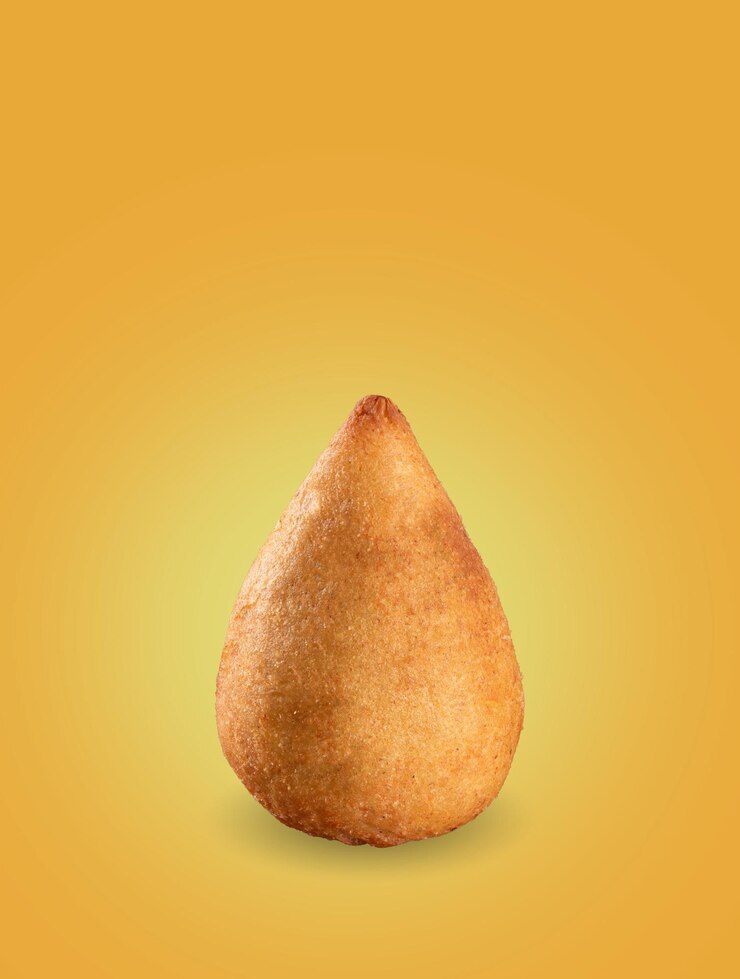 Coxinha Lanche tradicional brasileiro Baqueta de frango fundo laranja