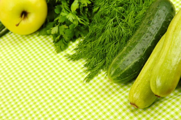 Cozinhar o conceito de legumes no fundo da toalha de mesa