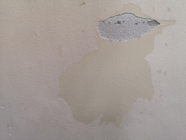 Crack e cor desliza de gesso de parede de cimento espalhado sobre concreto polido fundo texturizado construção cinza abstrata Construção