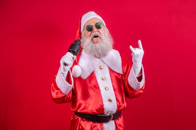 Crazy Santa Claus cantando rock in roll