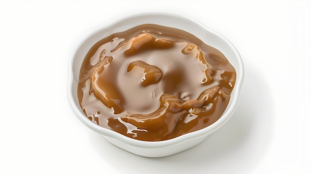 Creamy Caramel Sauce in weißer Schüssel auf neutralem Hintergrund Ideal für Dessert-Toppings und süße Rezepte Perfekt für Food-Blogger und Menü-Designs Lecker und verlockend KI