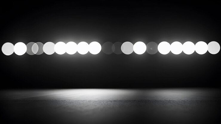 Crear un fondo abstracto minimalista que explore la interacción de la luz y la sombra utilizando monoc