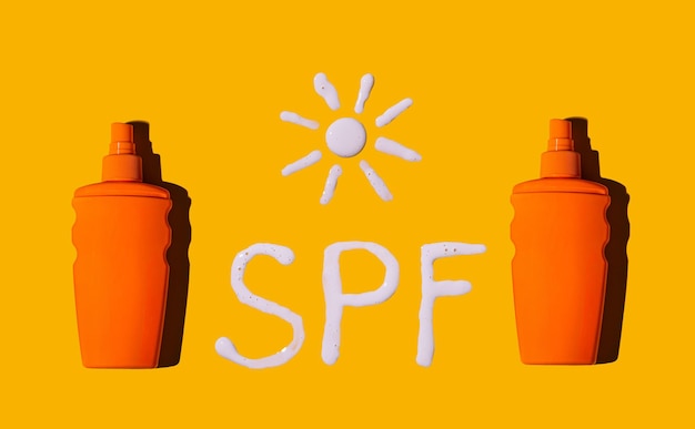 Crema protectora solar spf sobre un fondo amarillo