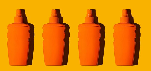 Creme protetor solar spf sobre fundo amarelo