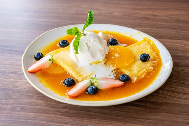 crepe suzette con helado de vainilla