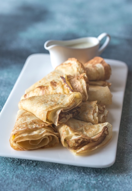 Crepes com molho de queijo azul