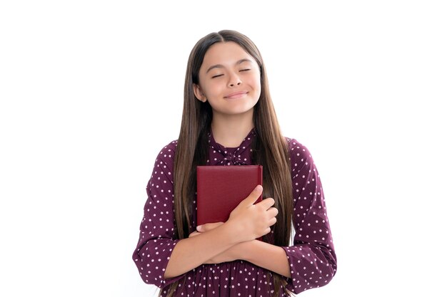 Foto criança em idade escolar com livro aprendizagem e educação