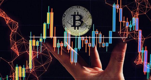 Criptomoeda e investimento Empresário usando tablet para se conectar na rede global e moeda bitcoin de ouro e crescimento do gráfico de negócios Mercado de ações financeiro