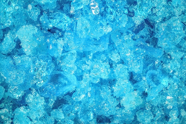 Foto cristales de sulfato de cobre azul bajo aumento de microscopio 4x - ancho de imagen = 8 mm