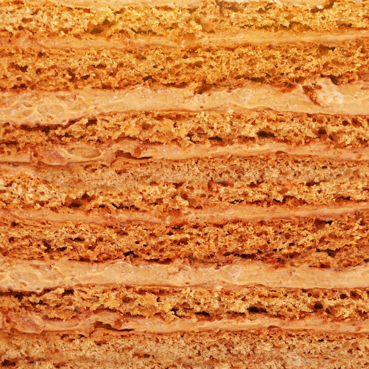 Foto crostas de bolo closeup e fundo de creme