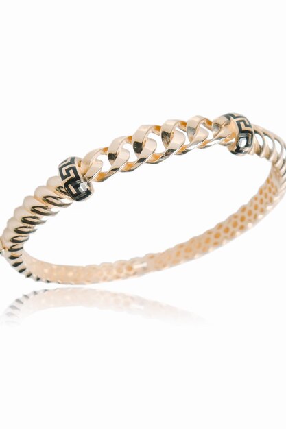 Cuadernilla de oro con elementos decorativos
