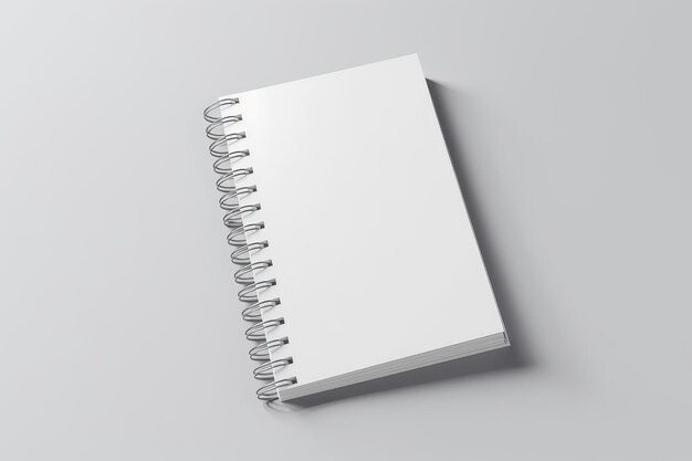 Un cuaderno blanco con una cubierta blanca y la palabra cuaderno en él.