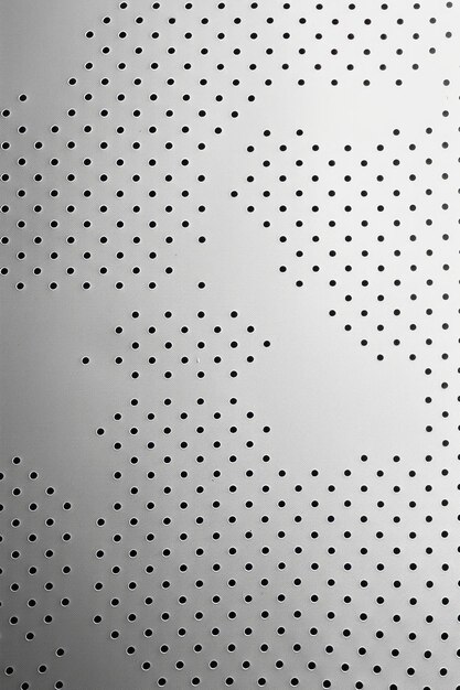Foto una cuadrícula minimalista de pequeños puntos negros en un lienzo blanco precisa y ordenada