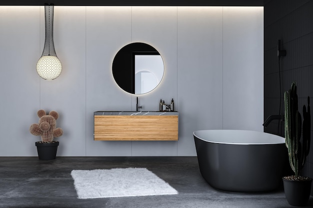 Cuarto de baño moderno con piso de concreto, bañera negra y espejo ovalado, lavabo de mármol, colgante