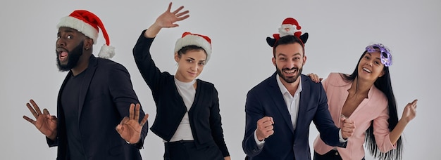 Los cuatro empresarios felices celebrando la navidad