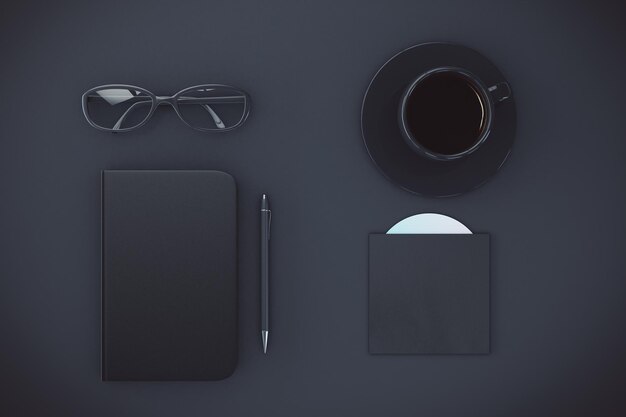 Cubierta de diario negro en blanco con taza de anteojos de café y disco de CD en maqueta de mesa negra