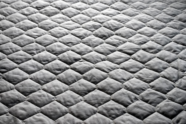 Cubierta de edredón texturizada con patrón de colchón en la cama