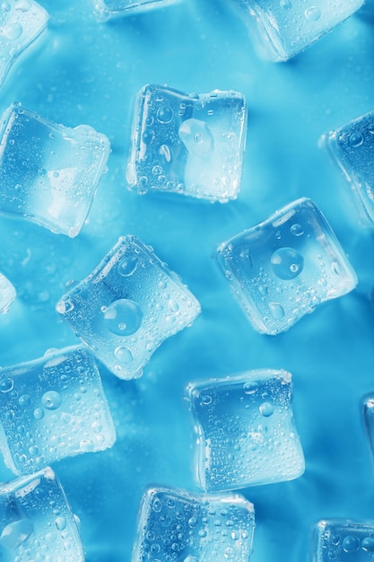 Cubitos de hielo con gotas de agua esparcidas sobre un fondo azul vista superior Hielo refrescante