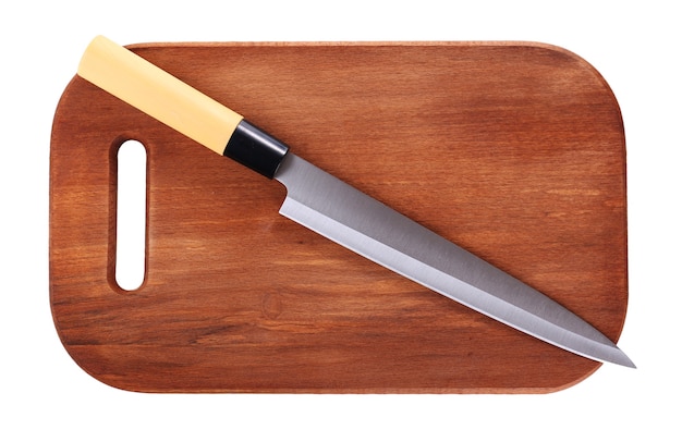 Cuchillo de cocina y tabla de cortar de madera.