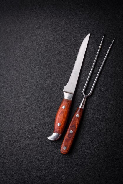 Foto cuchillo y tenedor de cocina de acero con espacio para copiar