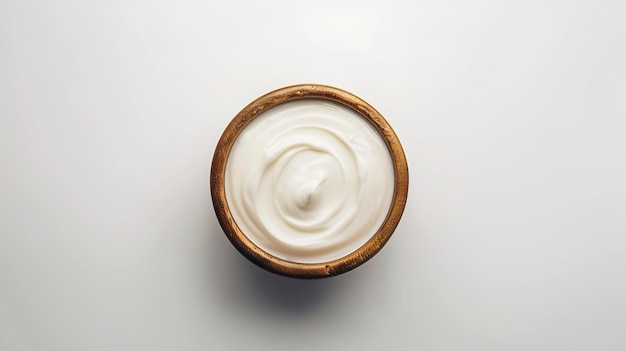 Cuenco de yogur cremoso blanco aislado sobre un fondo blanco vista superior plana generativa de IA