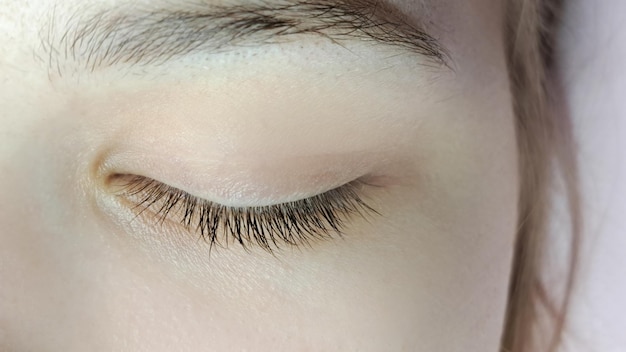 Cuidado de los ojos con extensiones de pestañas tratamiento de salón de belleza