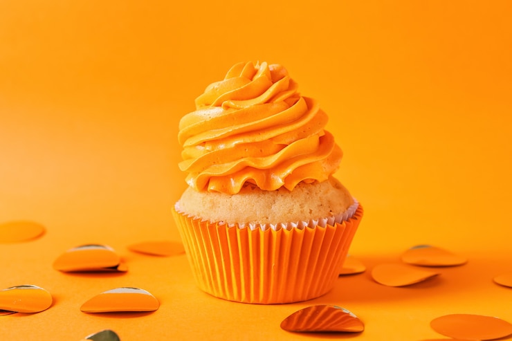 Foto cupcake de aniversário delicioso na cor de fundo