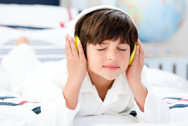 Cute boy listeningning music