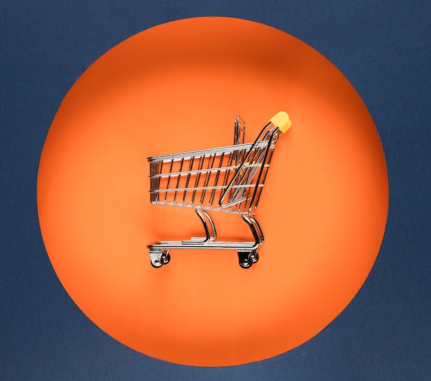 Cyber segunda-feira carrinho de compras laranja círculo