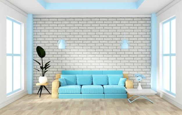 Dachbodeninnenspott oben mit Sofa und Dekoration und weißer Backsteinmauer auf Bretterboden