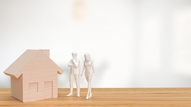 Das Hausholz und die Figur auf dem Tisch für das Immobilien- oder Nachlasskonzept 3D-RenderingxA
