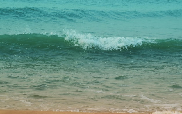 Das Hintergrundbild ist Meer und Sand